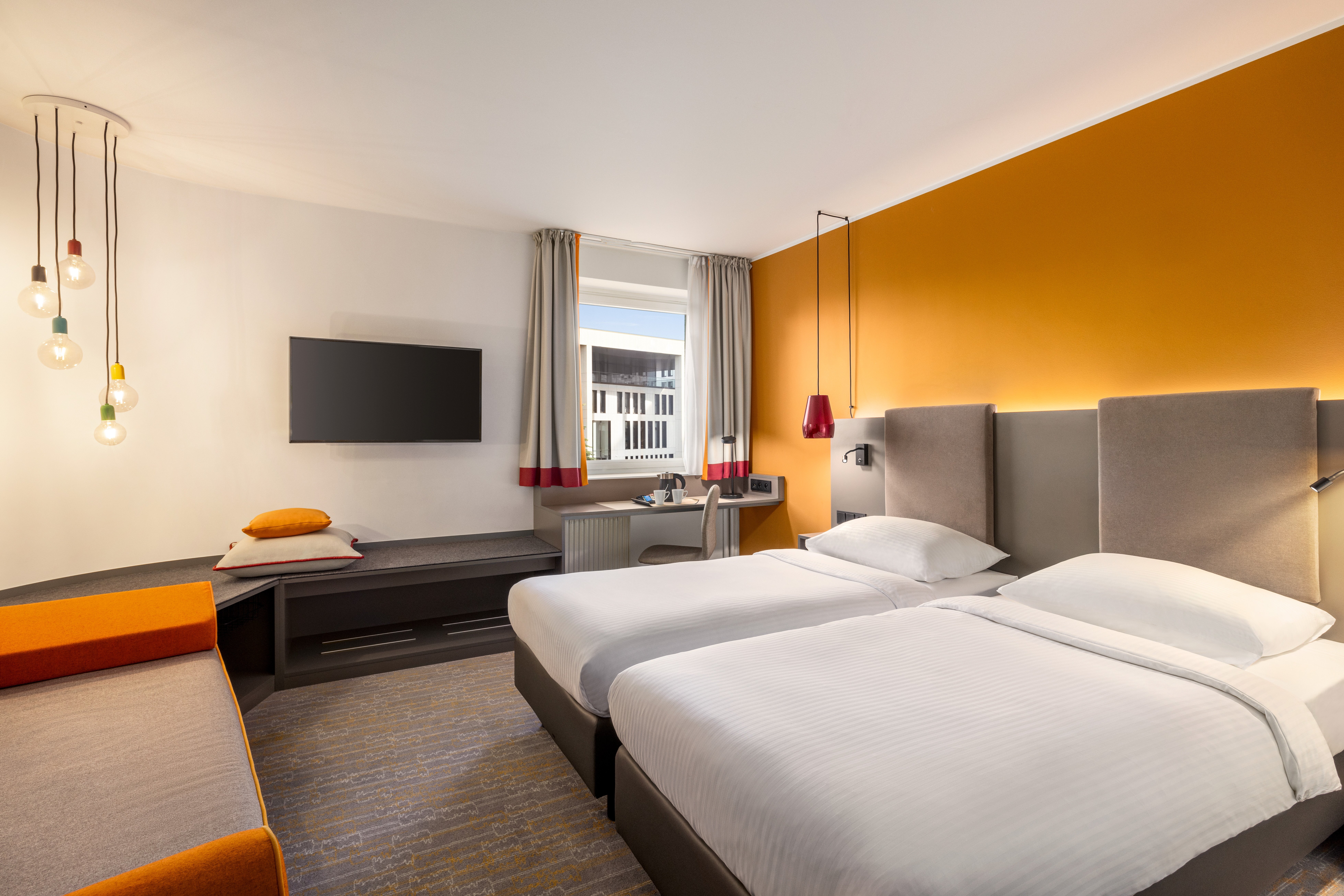Vienna_House_Easy_by_Wyndham_Lounge_Room